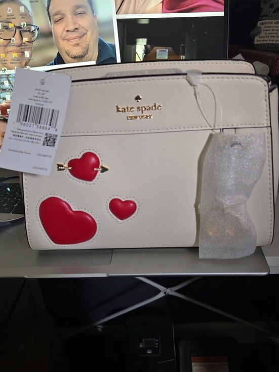 kate spade Handbags - kate spade cream crossbody with red heart appliqués and gold logo